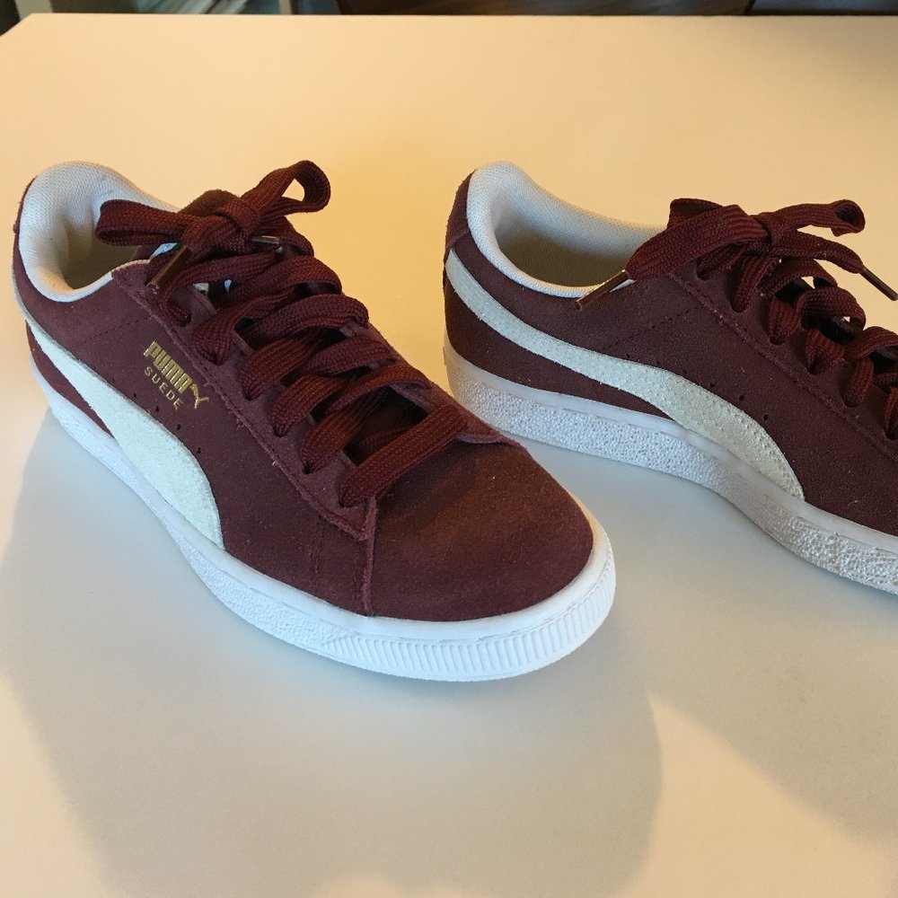 Wine colored suede Pumas